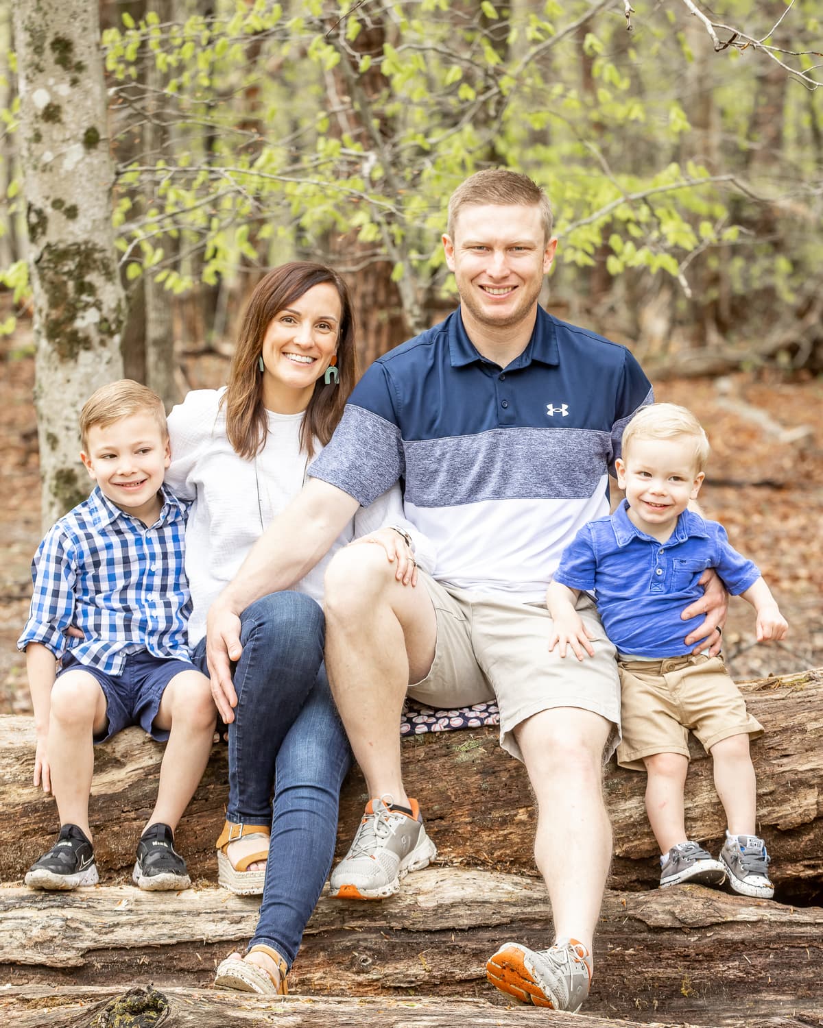 Travis Godec with his wife and two sons
